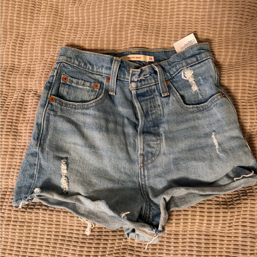 Levi’s high waisted distressed shorts